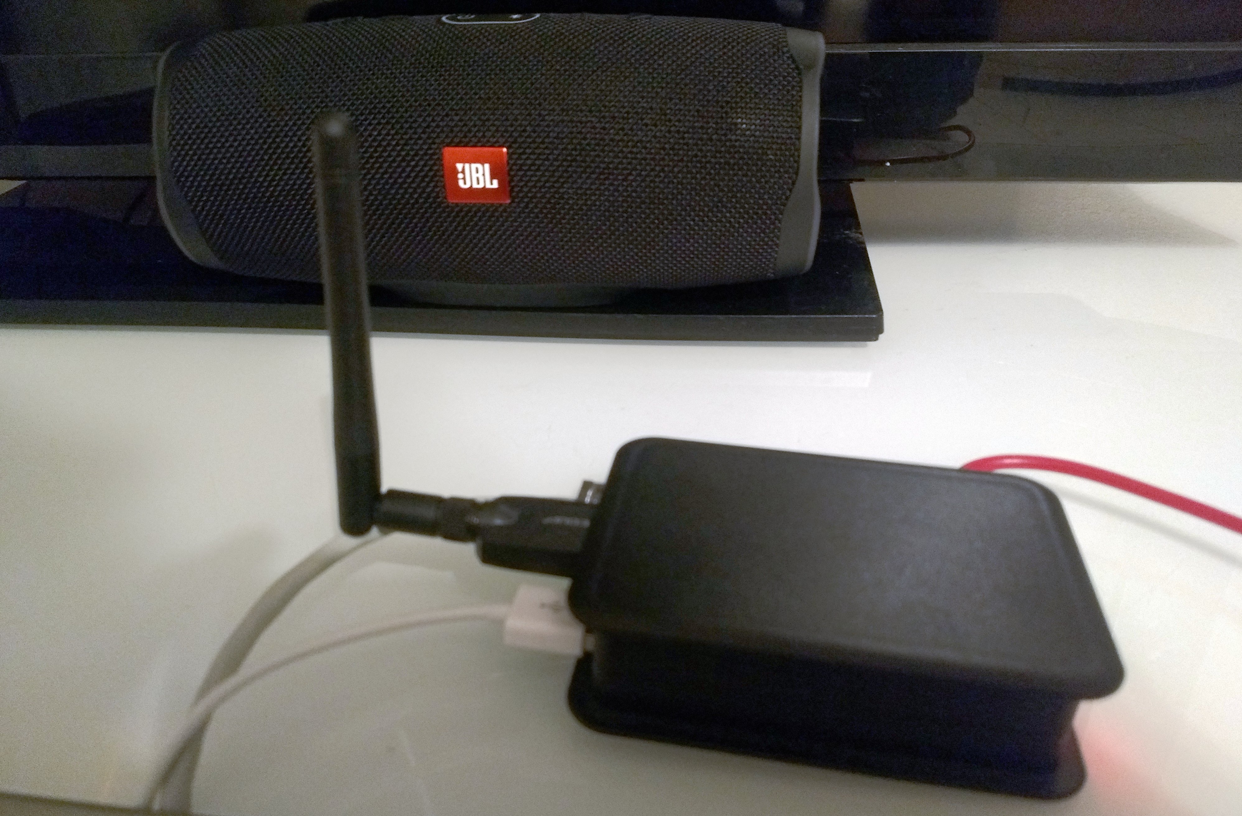 photo of the bluetooth speaker and dongle